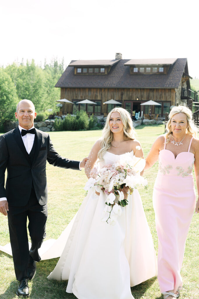Luxury wedding ceremony at Devil’s Thumb Ranch in Colorado