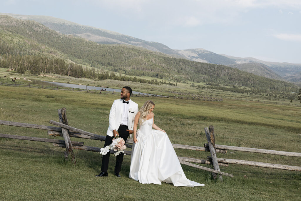 Bride and groom with mountain views at Devil’s Thumb Ranch