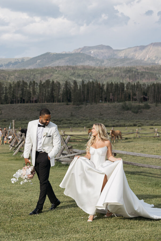 Bride and groom with mountain views at Devil’s Thumb Ranch
