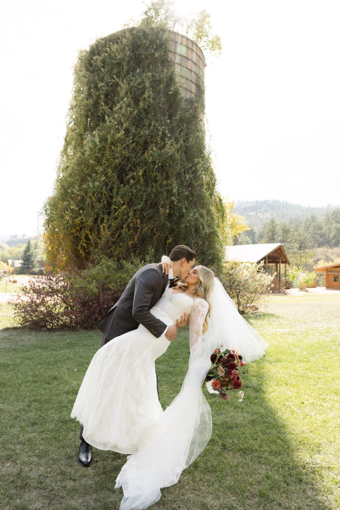 Bride and groom in fall colors at Planet Bluegrass in Lyons, Colorado
