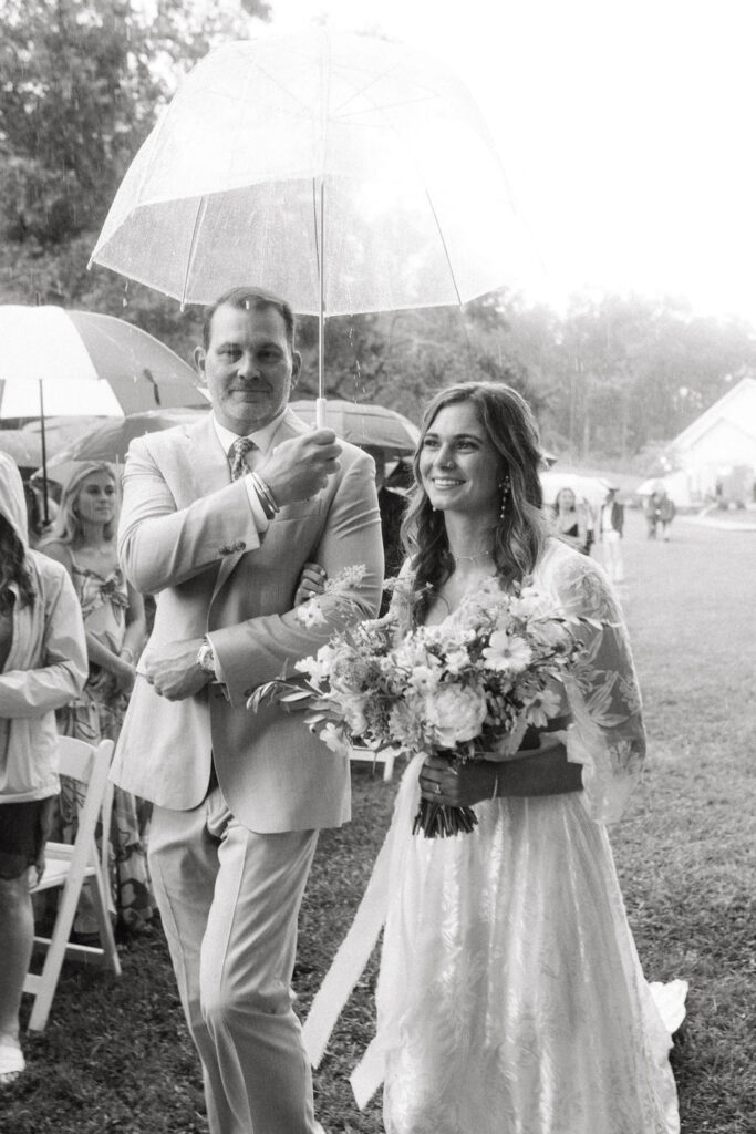 A rainy Rockhurst Farm wedding ceremony