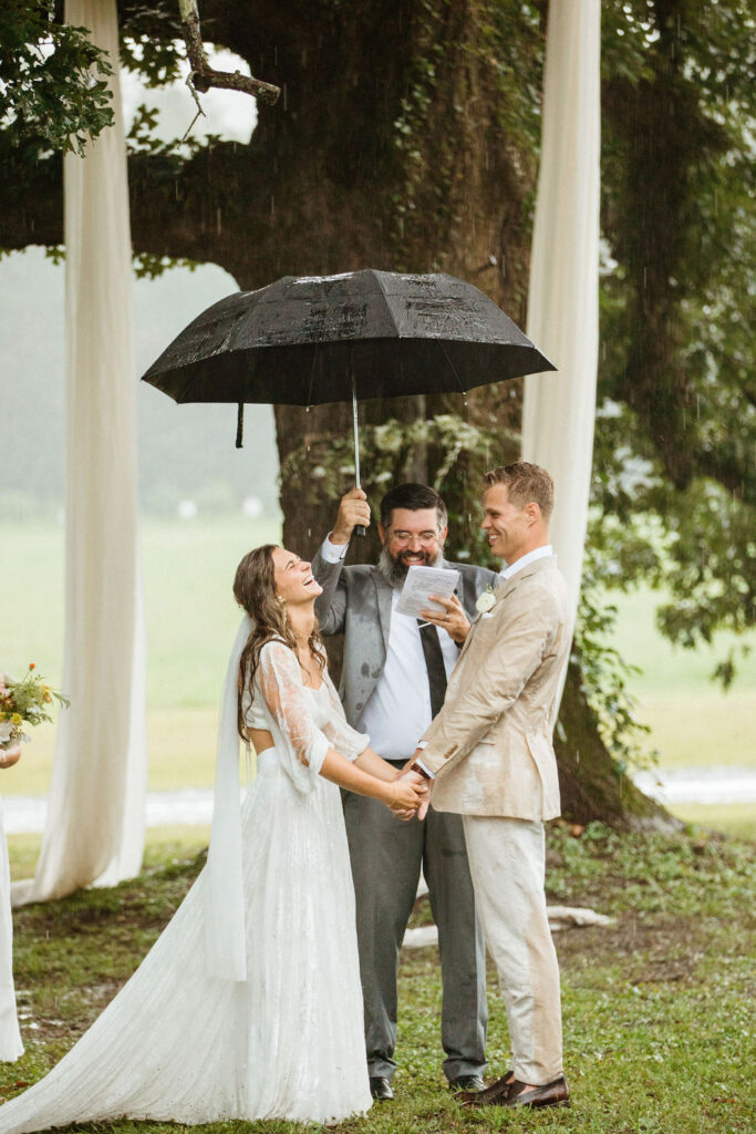 A rainy Rockhurst Farm wedding ceremony