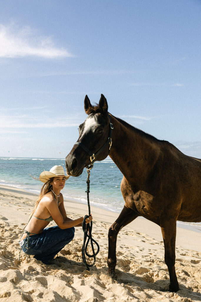 Coastal cowgirl branding photoshoot in Hawaii on the North Shore with horses
