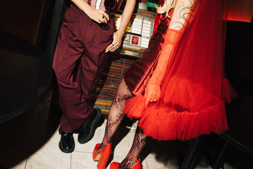 Creative Retro Engagement Photos at a bar in Denver