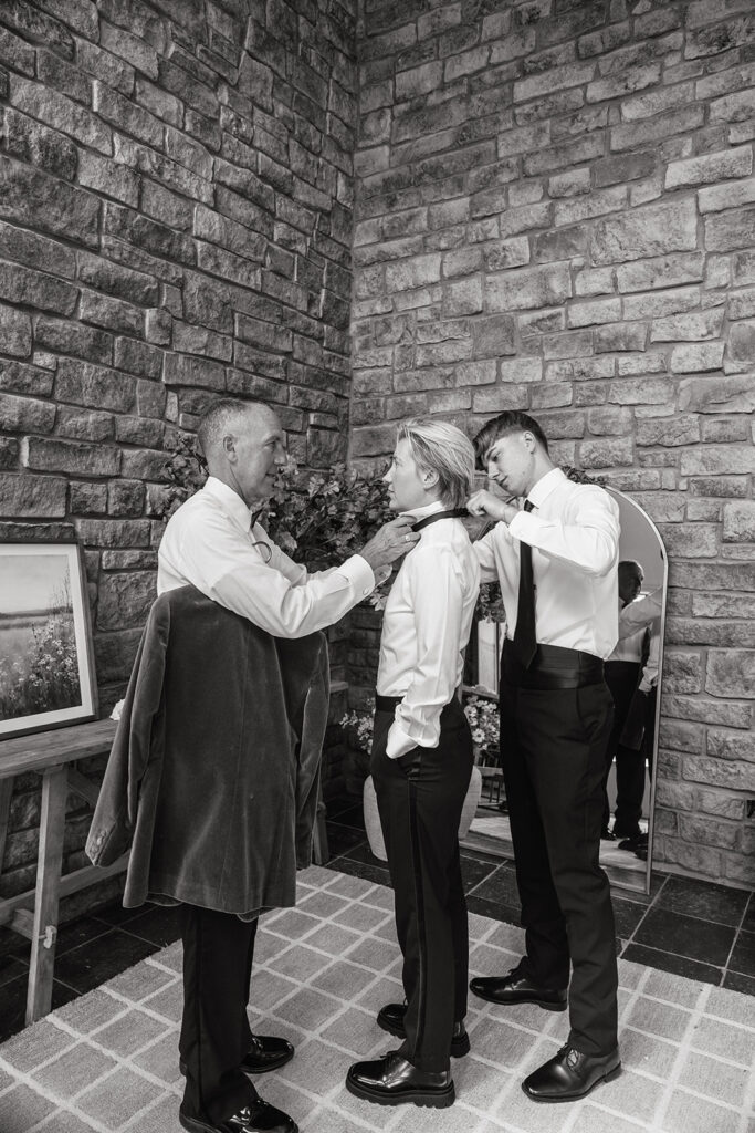 Bride gets ready with dad and brother
