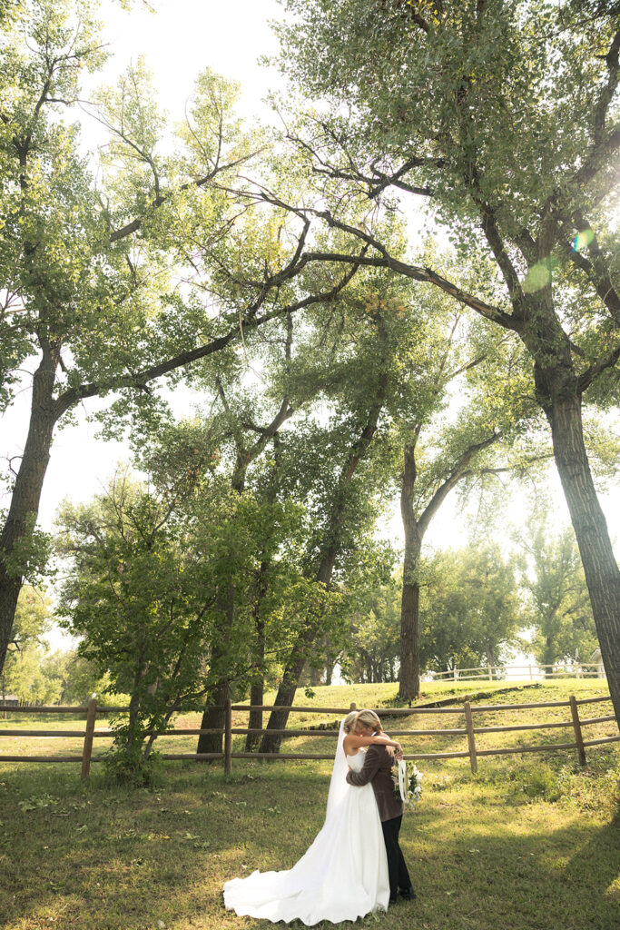 Bride and bride photos in the trees during golden hour