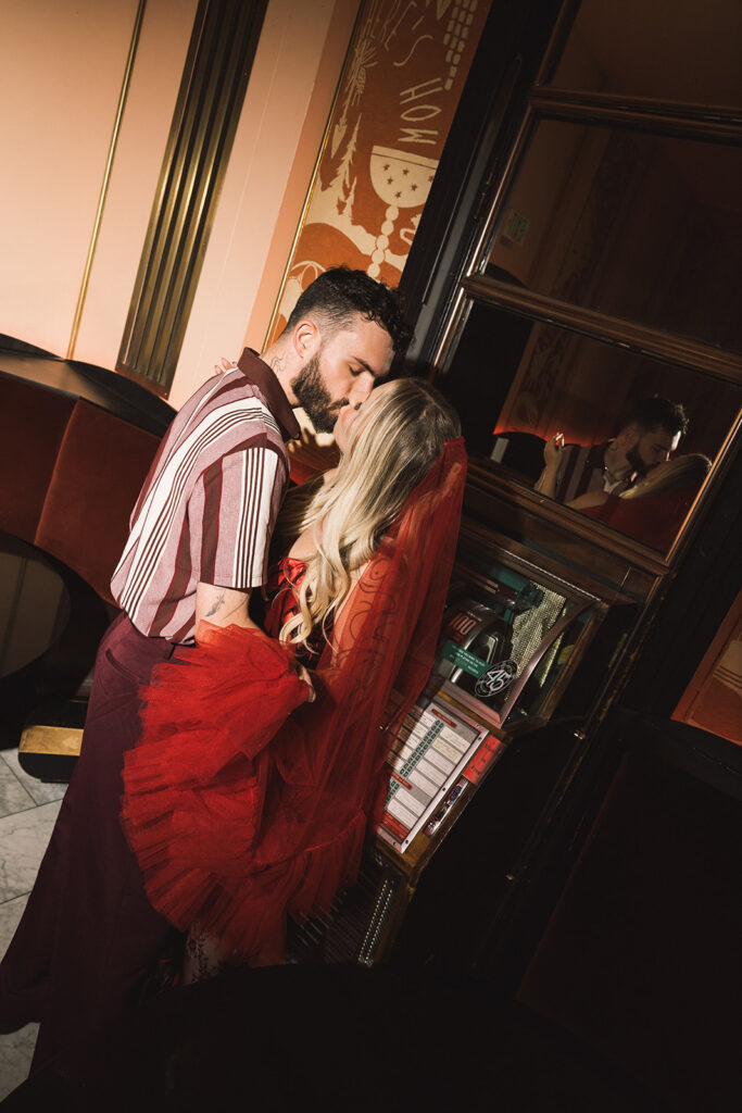 Bar engagement photos in Denver at The Cruise Room in The Oxford Hotel