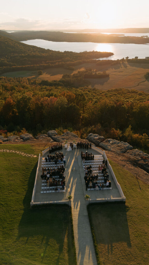 Drone shot of a sunset ceremony at Stone Haven Event Venue in Alabama
