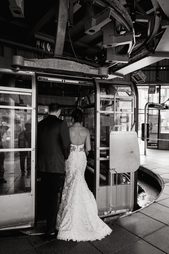 Bride and groom board a gondola to head up to Vail Mountain