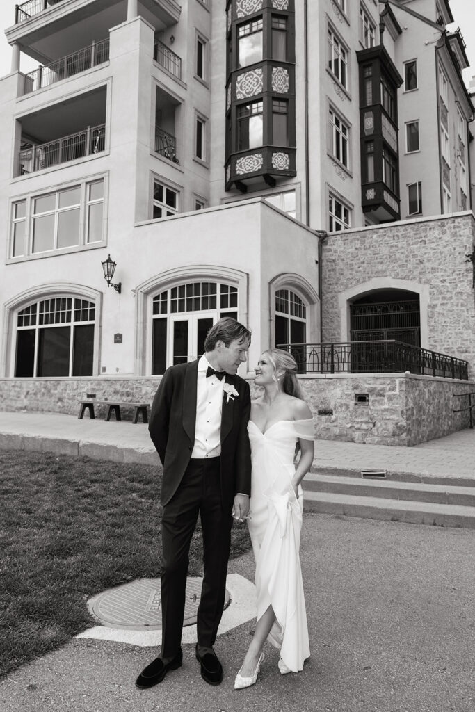 Bride and groom outside of the Sonnenalp Hotel