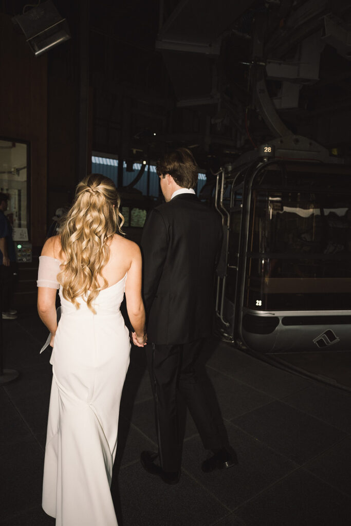 Bride and groom boarding the gondola