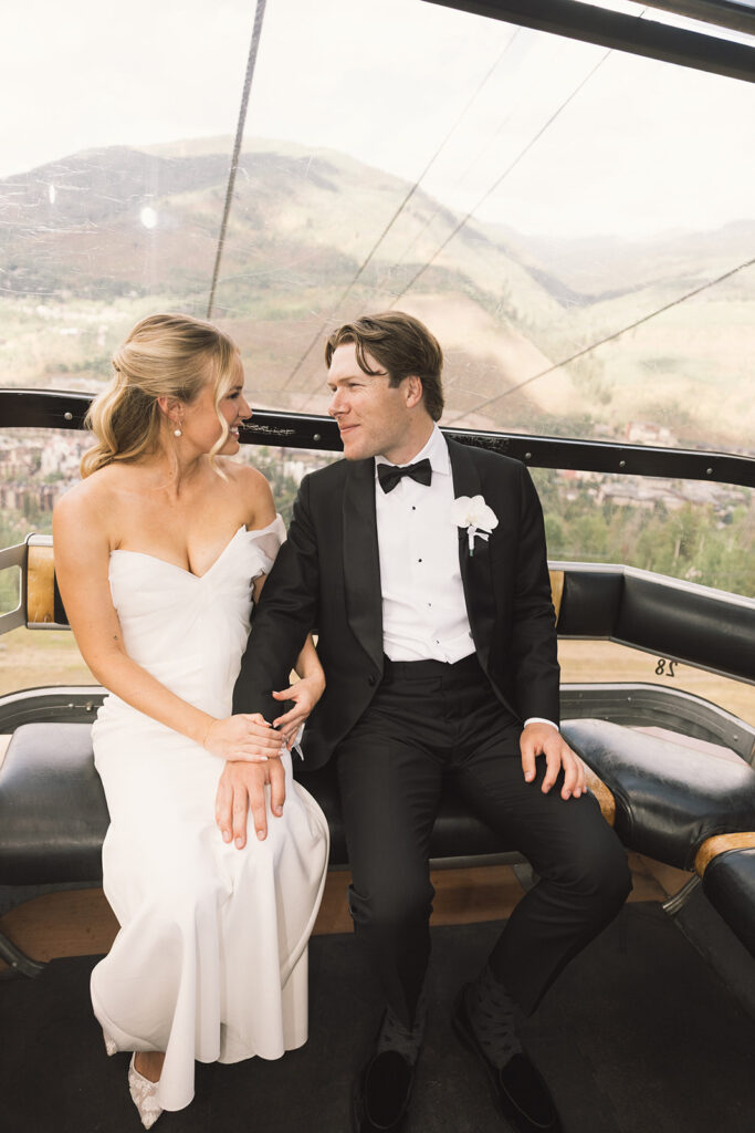 Bride and groom ride on the gondola